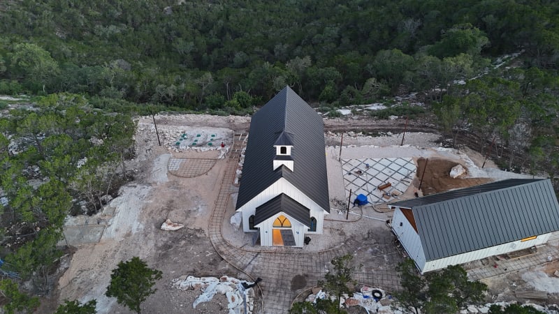 Aerial view of The Chapel at Wimberley and its grounds in the Texas Hill Country